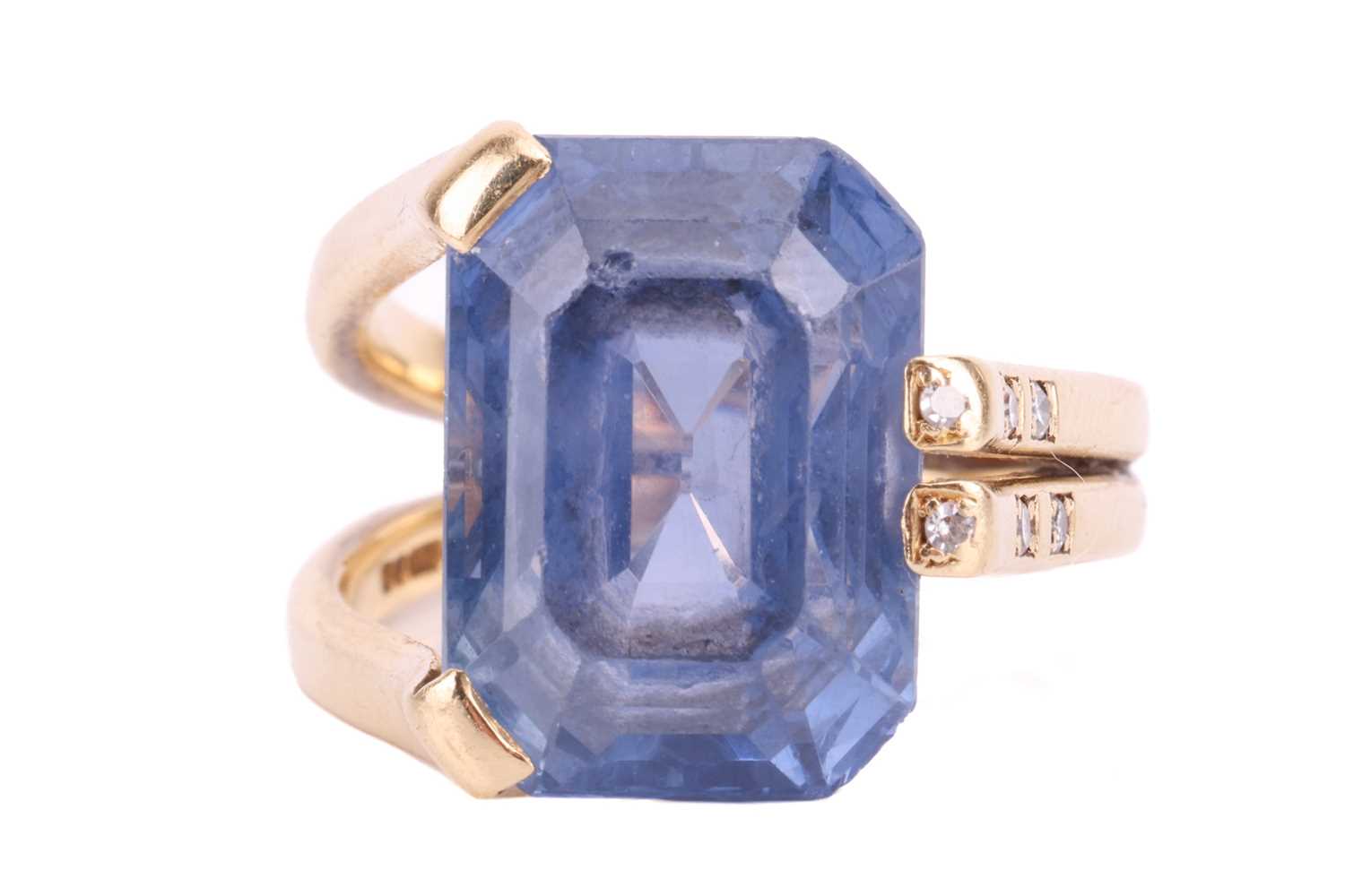 An unheated colour-change Ceylon sapphire solitaire ring, featuring an octagonal step-cut sapphire o