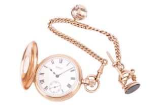 An early twentieth-century 9ct gold half-hunter pocketwatch, by Waltham, featuring a cream face with