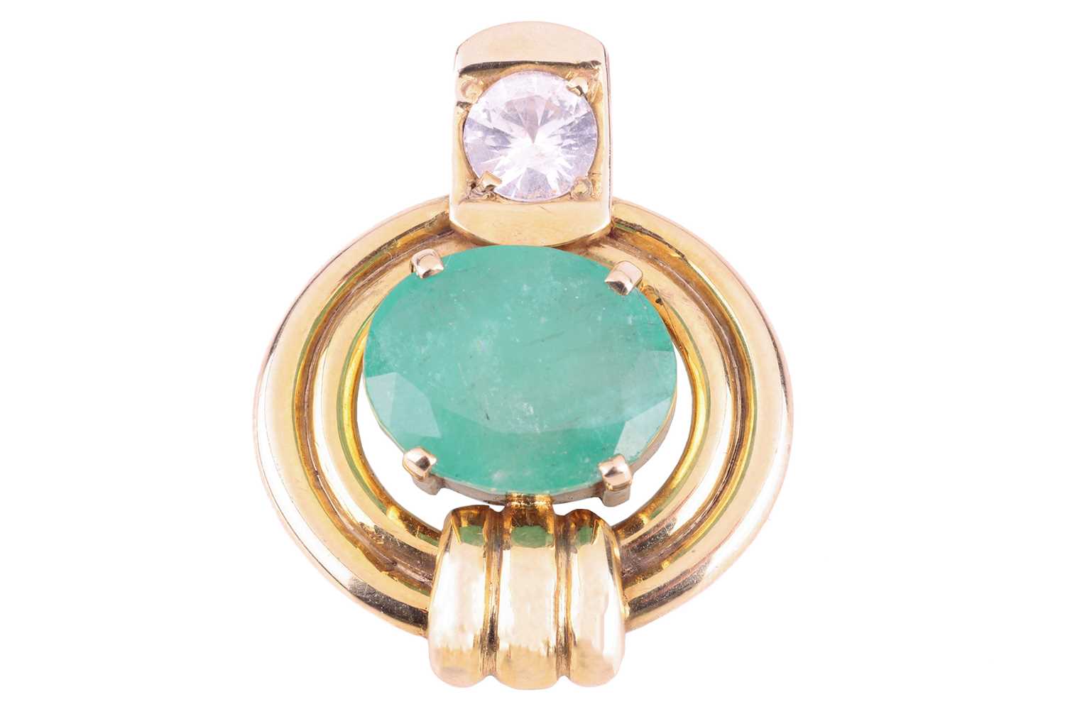 An emerald and white sapphire pendant, set with a central oval-cut emerald in claw mount, approximat