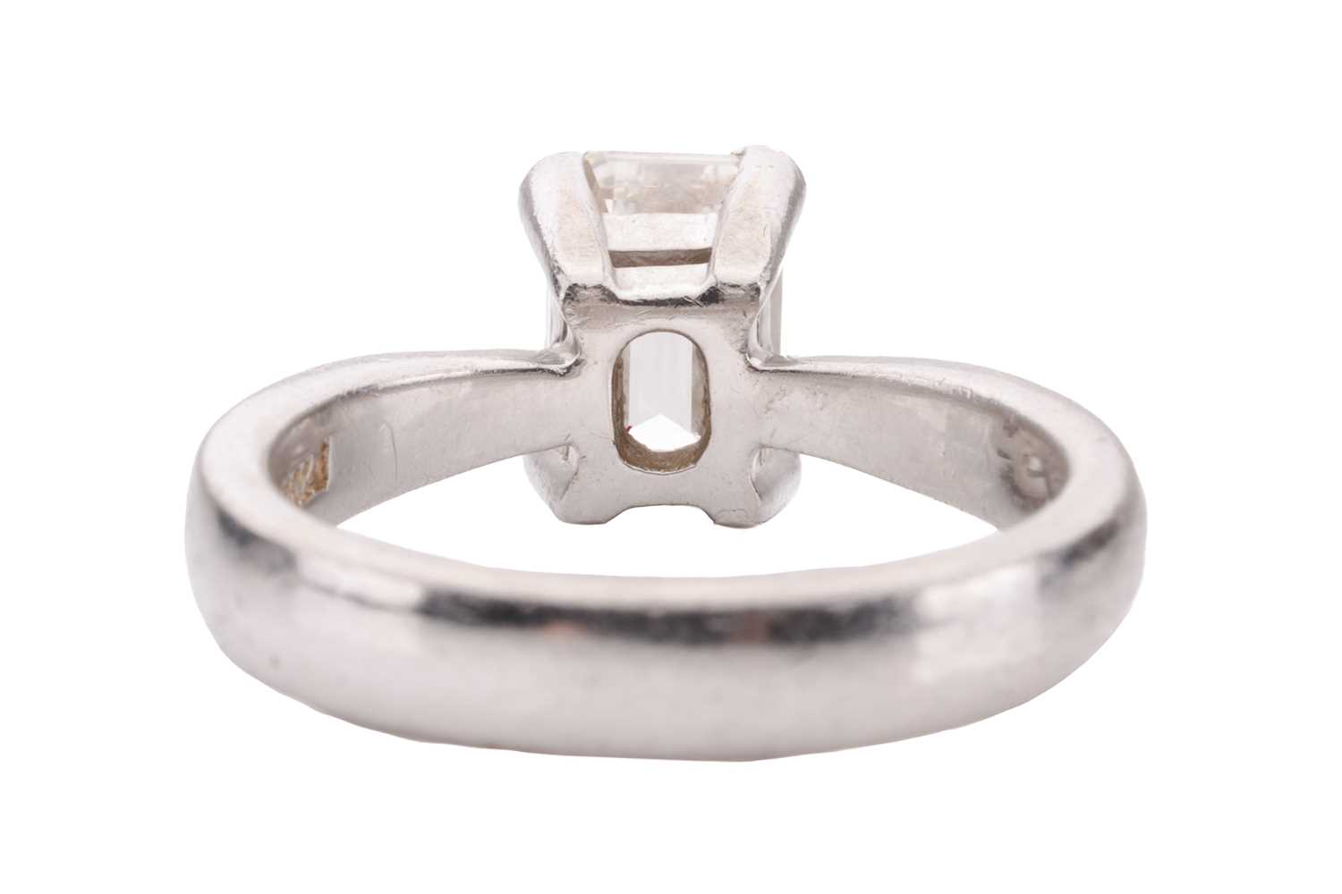 A diamond solitaire ring, set with an emerald-cut diamond with an estimated weight of 1.20ct, in a c - Image 4 of 4