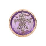 An amethyst fleur-de-lis cocktail ring, the fleur-de-lis emblem set with rose cut diamonds and mount