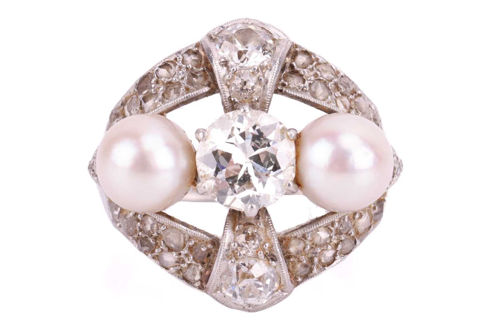 An old-cut diamond and pearl cocktail ring, the principal old European-cut diamond measuring