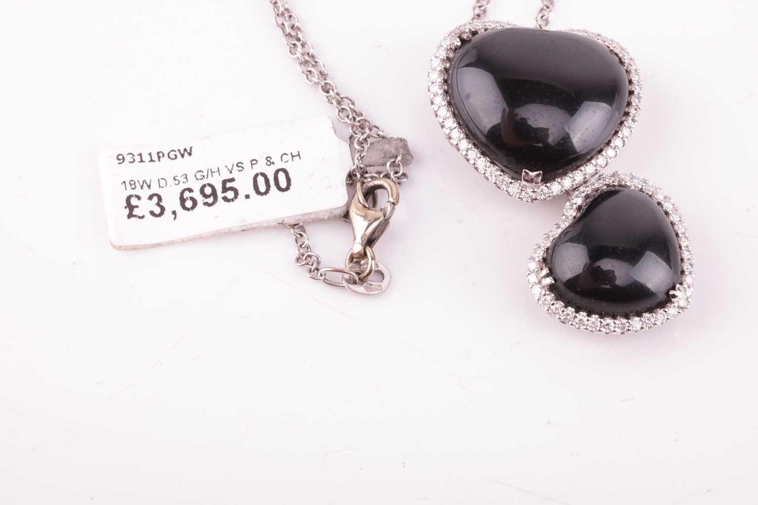 A Whitby jet and diamond double heart pendant on chain, featuring two heart-shaped jet cabochons, fr - Image 3 of 3