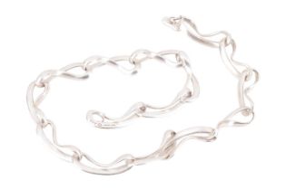 Georg Jensen - an 'Infinity' link necklace, comprising a series of curving links in the form of