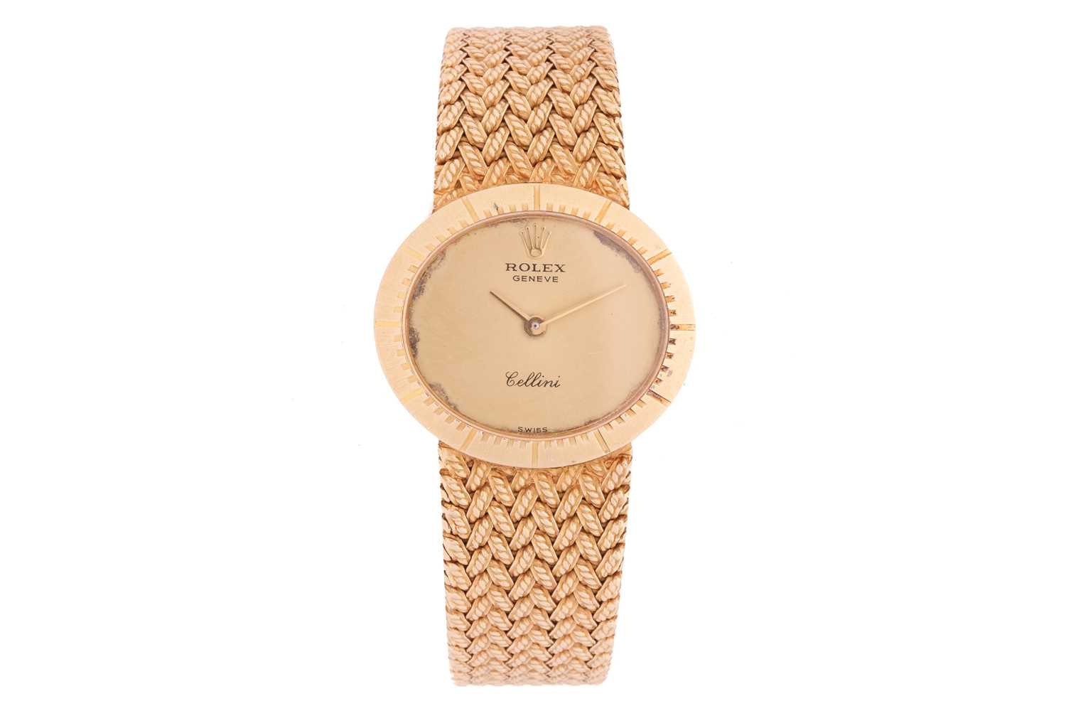 An 18ct gold Rolex Cellini ladies wristwatch, featuring a champagne face with gilded hands, set in a