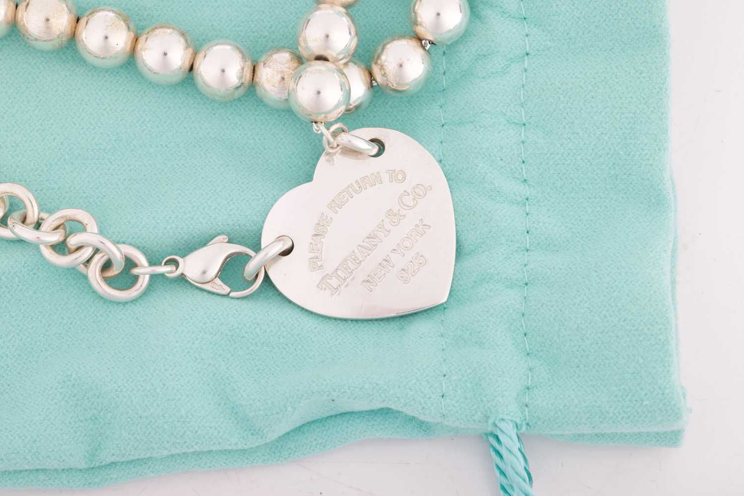 Tiffany - A 'Return to Tiffany' silver tag necklace, the heart shape panel inscribed 'Please return  - Image 3 of 4
