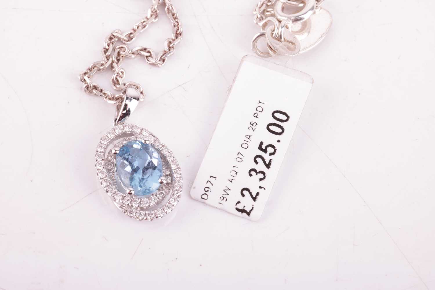 An aquamarine and diamond-set oval pendant, featuring an oval aquamarine, with an estimated carat we - Image 3 of 3