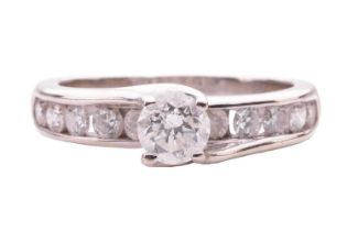 A diamond solitaire ring, the central round brilliant diamond measuring approximately 4.85mm, with a