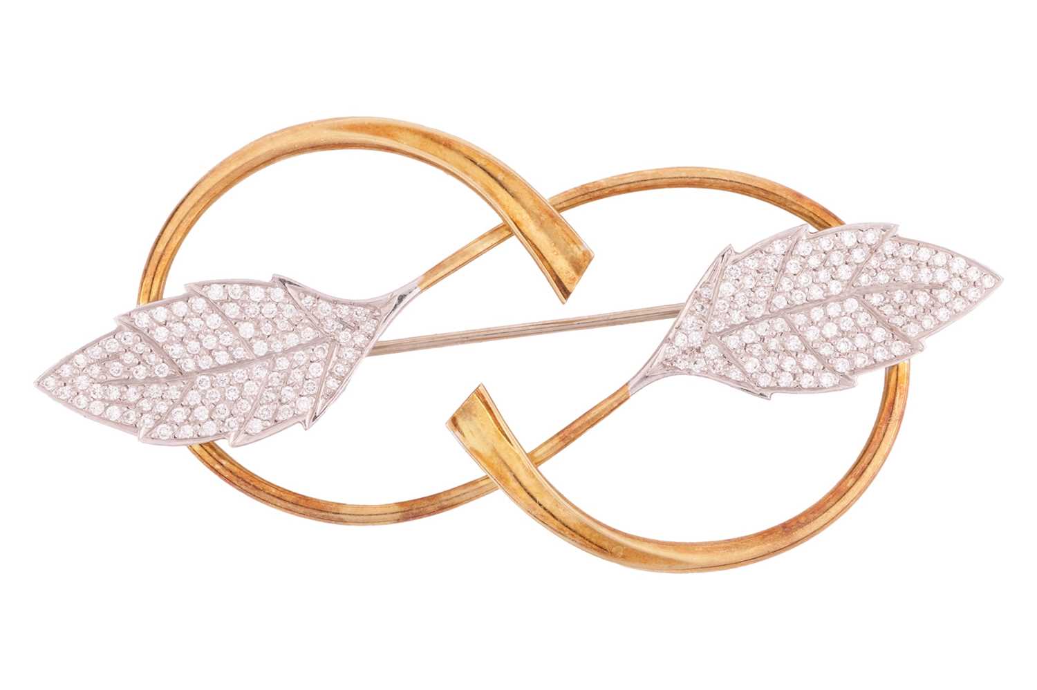 A diamond-set leaf brooch, depicting two leaf motifs, pavé set with round brilliant diamonds, to int
