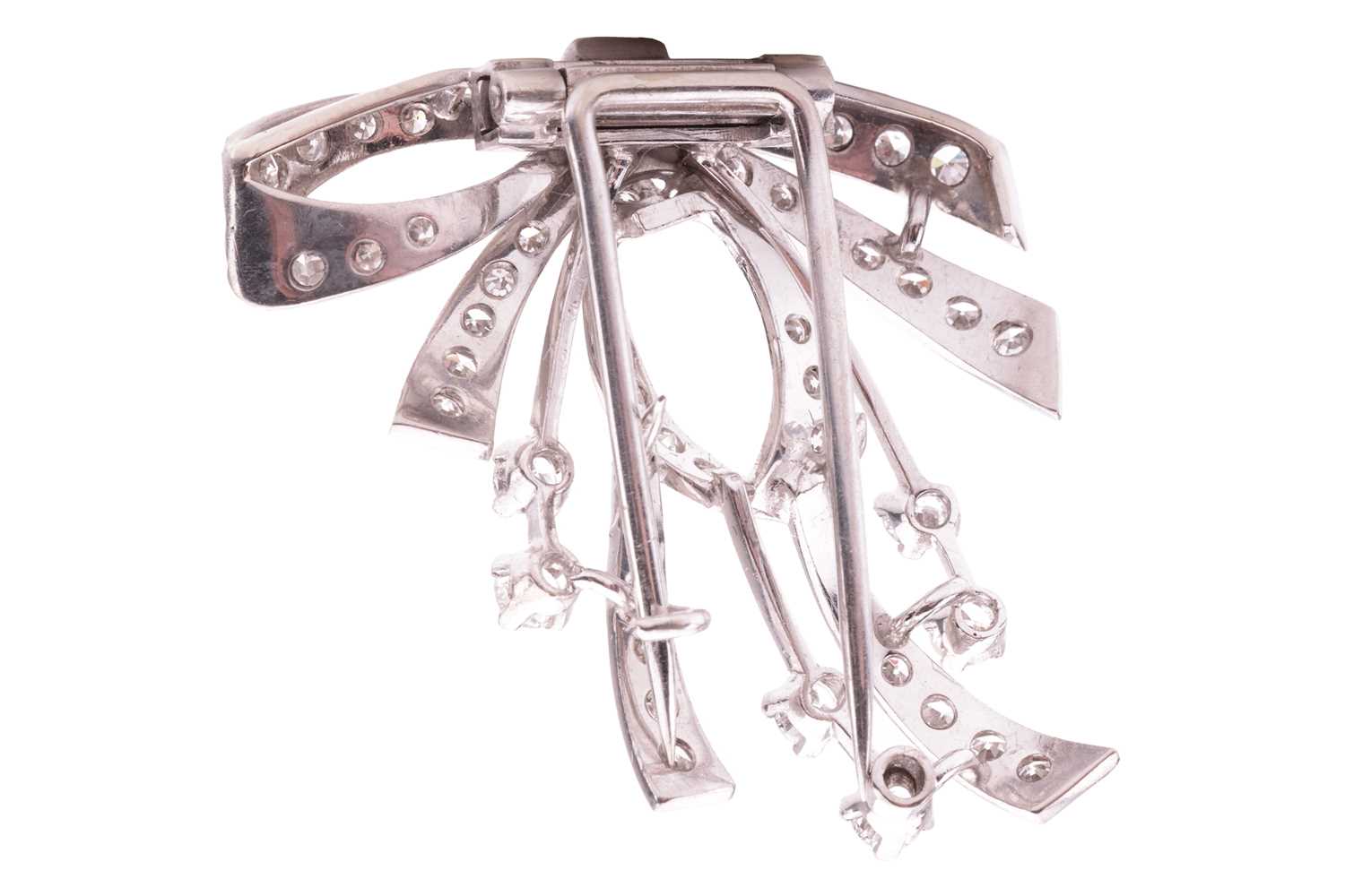 A diamond-set bow dress clip/brooch, the central bow and ribbons claw-set with single-cut diamonds,  - Image 2 of 2