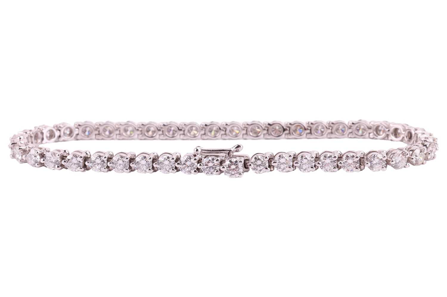 A diamond line bracelet by David Morris, claw set with 44 round brilliant diamonds measuring - Image 3 of 5