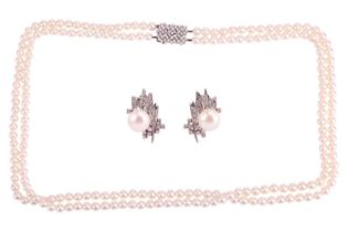 A double-row cultured pearl necklace with diamond clasp, together with a pair of pearl and diamond