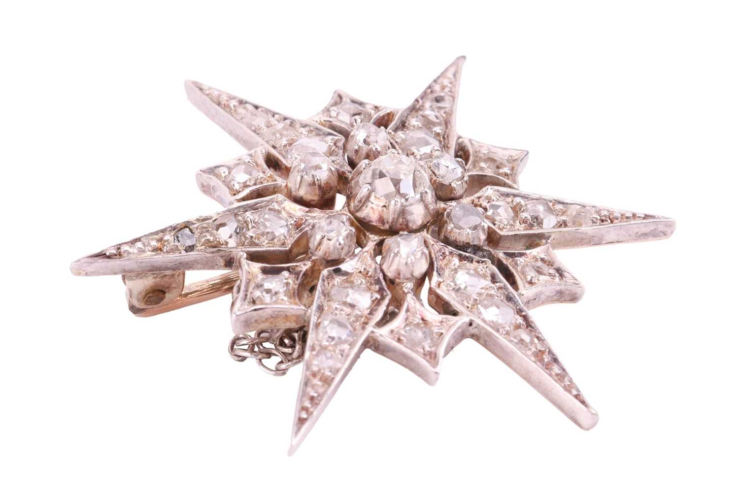 A Victorian star brooch, set throughout with diamonds, the largest central old-cut diamond measuring - Image 2 of 3