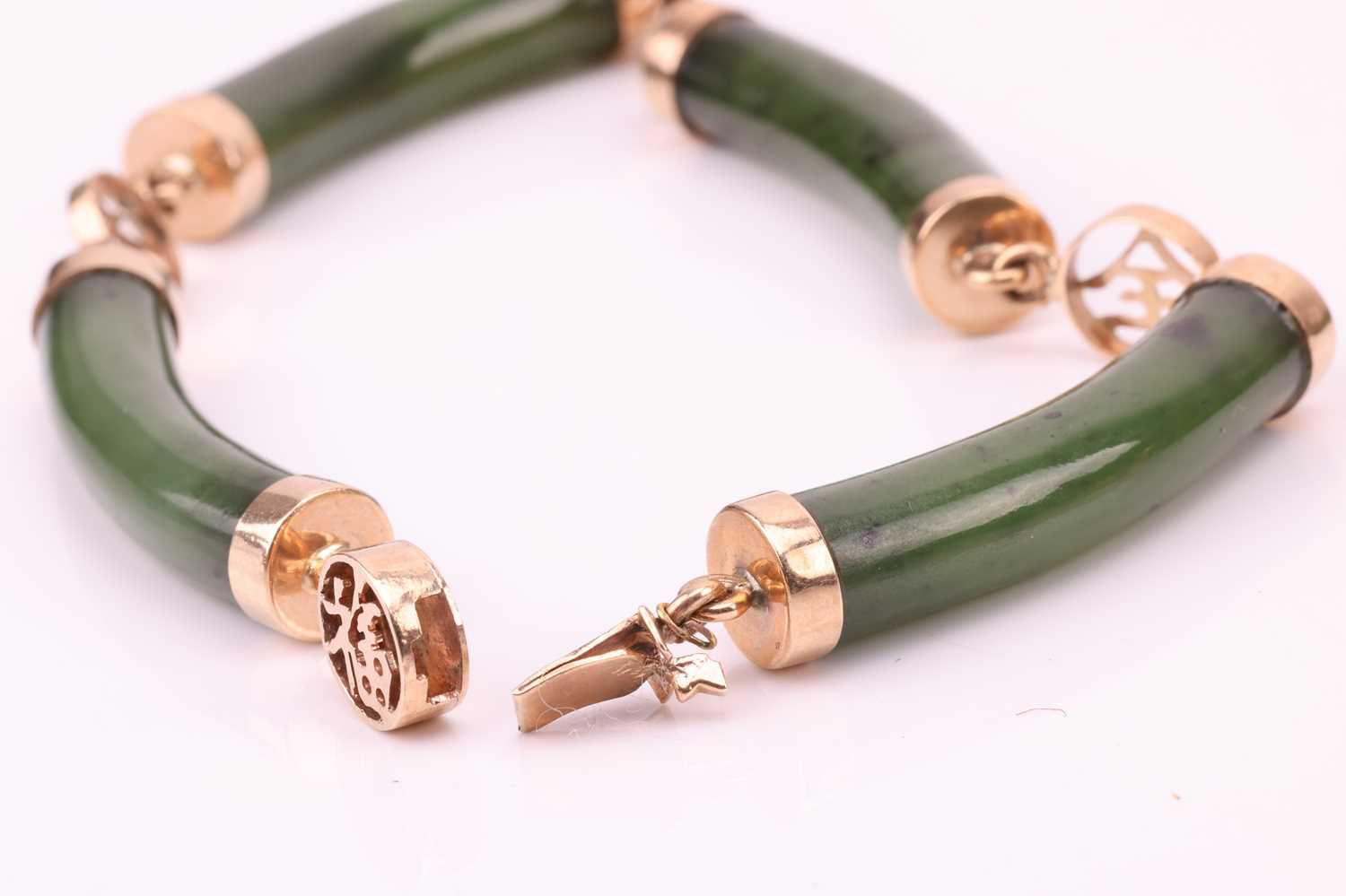 Two Chinese nephrite bracelets, comprising curved nephrite bars, flanked with pierced spacers spelli - Image 7 of 7