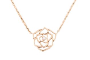 Piaget - a diamond-set rose Dentelle necklace in 18ct rose gold, the openwork rosette pendant highli