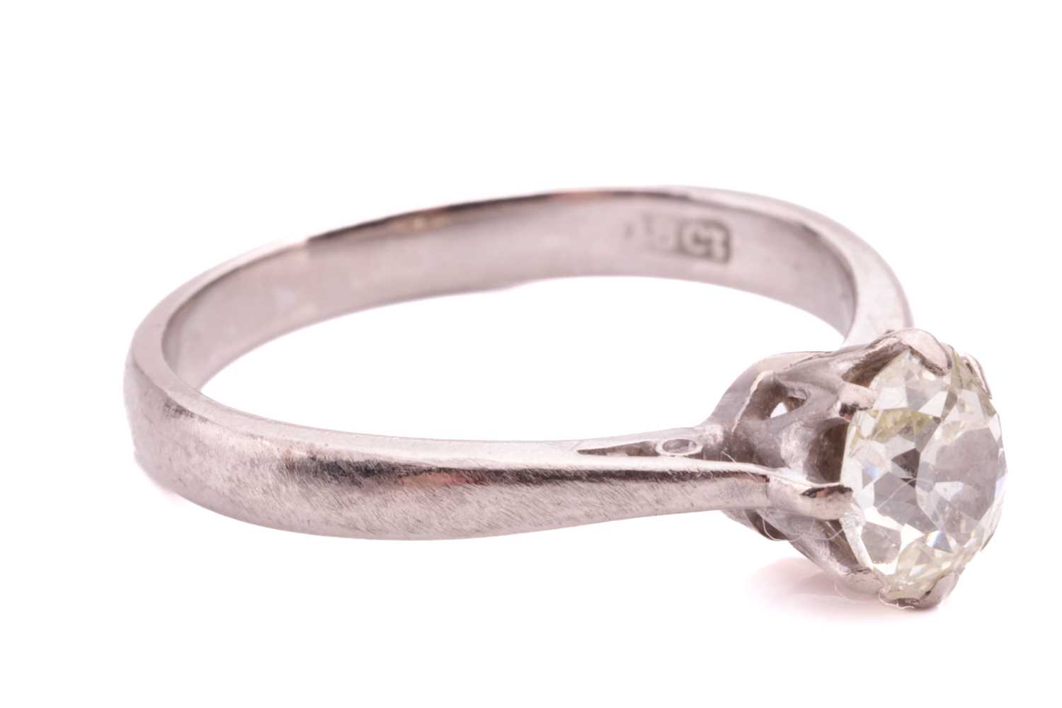 An old-cut diamond solitaire ring, coronet-set with an oval old-cut diamond of tinted yellow colour, - Image 2 of 4