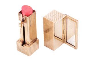 Kurt Weiss - a lipstick holder with mirror in 9ct yellow gold, of reeded rectangular prism form, the