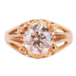 A diamond solitaire ring, the round brilliant diamond measuring approximately 8.9mm, with an estimat