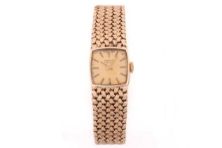 A 9ct yellow gold ladies' dress watch by Marvin, with a manual automatic movement, featuring a