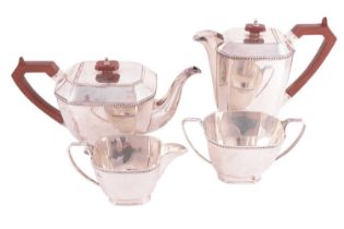 A four-piece silver tea service, by William Suckling Ltd, Sheffield 1946, comprising a teapot, hot