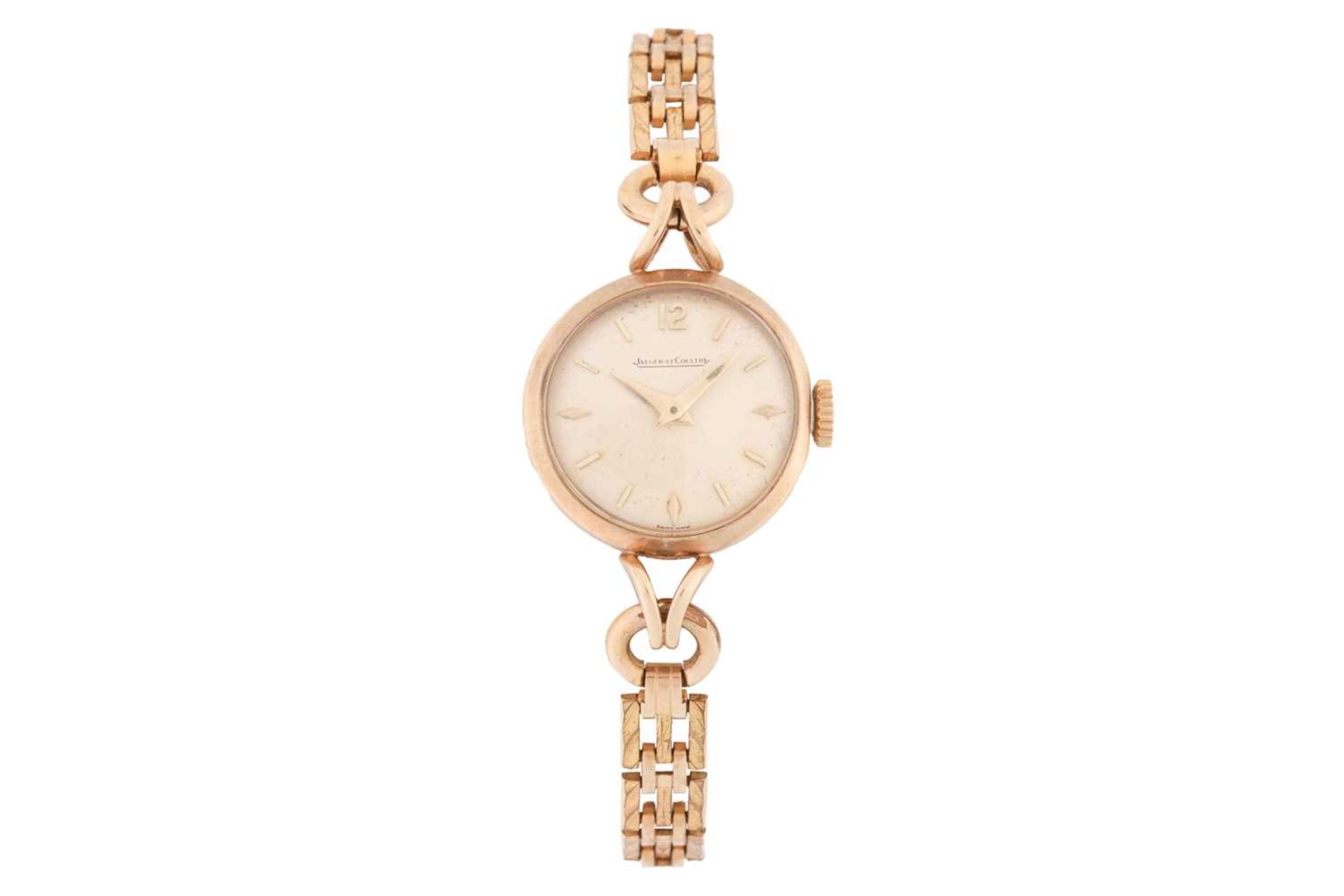 A ladies Jaeger LeCoultre dress watch, with a manual mechanical movement, featuring a cream face in 