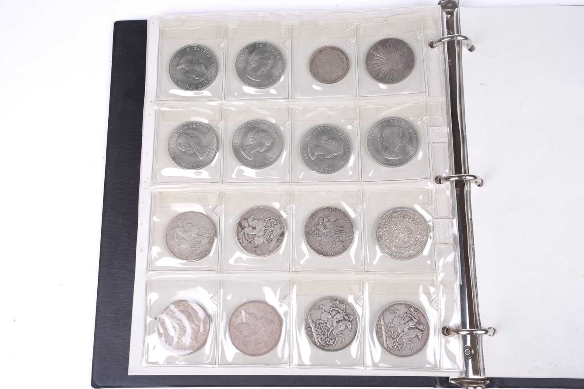 An album containing a collection of coins, George II and later, to include silver crowns and coins,  - Image 13 of 20