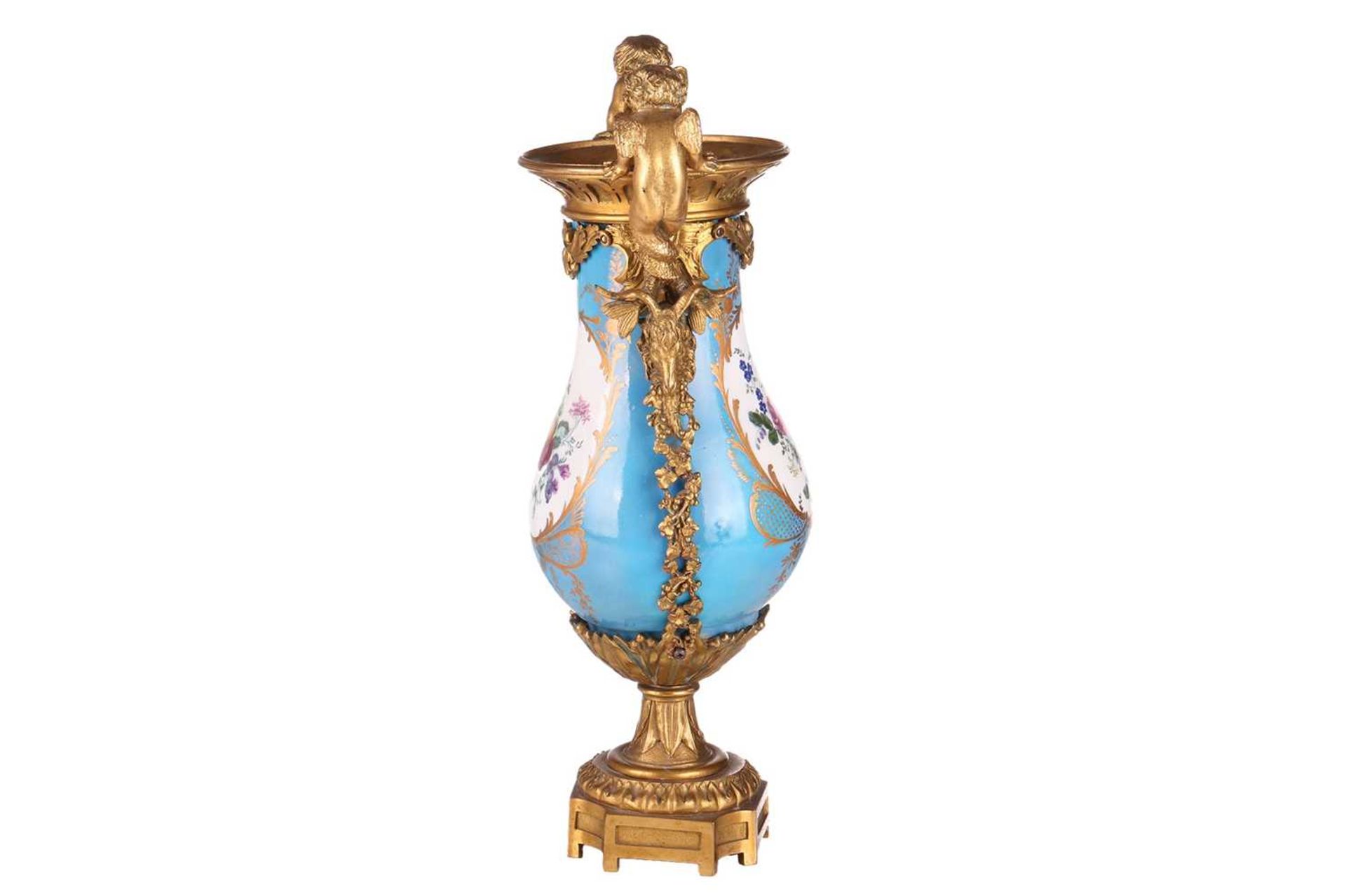 A French Napoleon III Sevres porcelain baluster base painted with scattered blooms and fruits on a B - Image 2 of 13