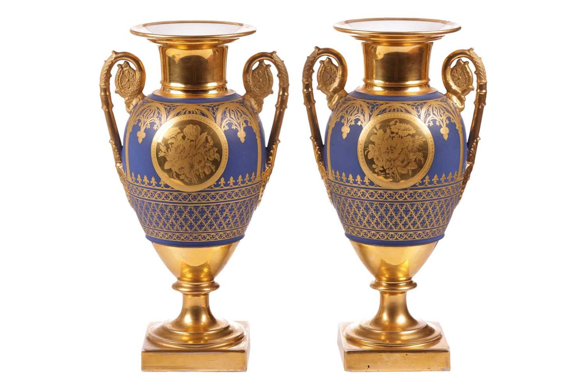 A pair of late 19th-century French pedestal vases, (possibly Paris Porcelain), gilt decorated on a d