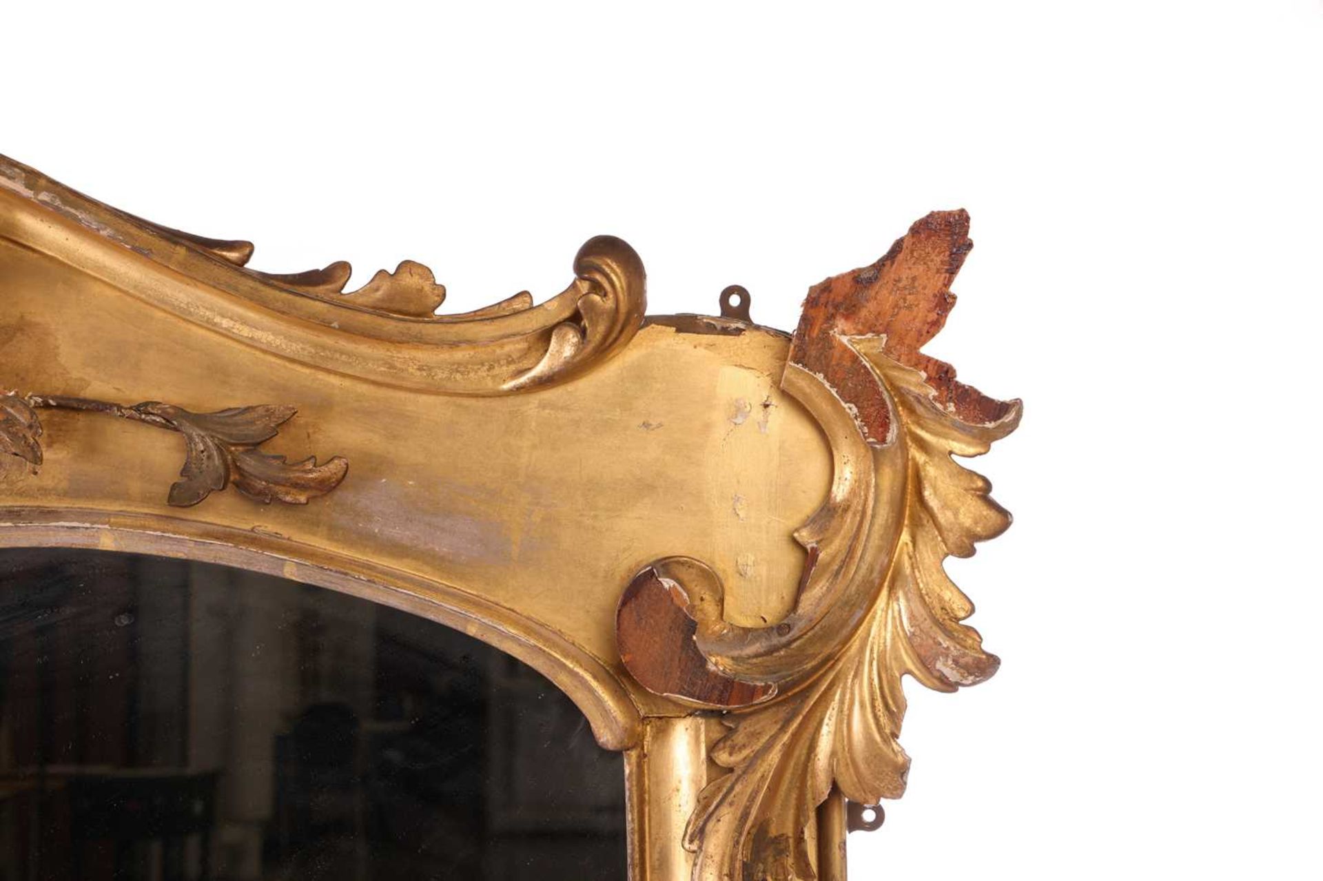 A 19th century giltwood overmantel mirror, the shaped top with applied floral sprays, foliate scroll - Bild 6 aus 14