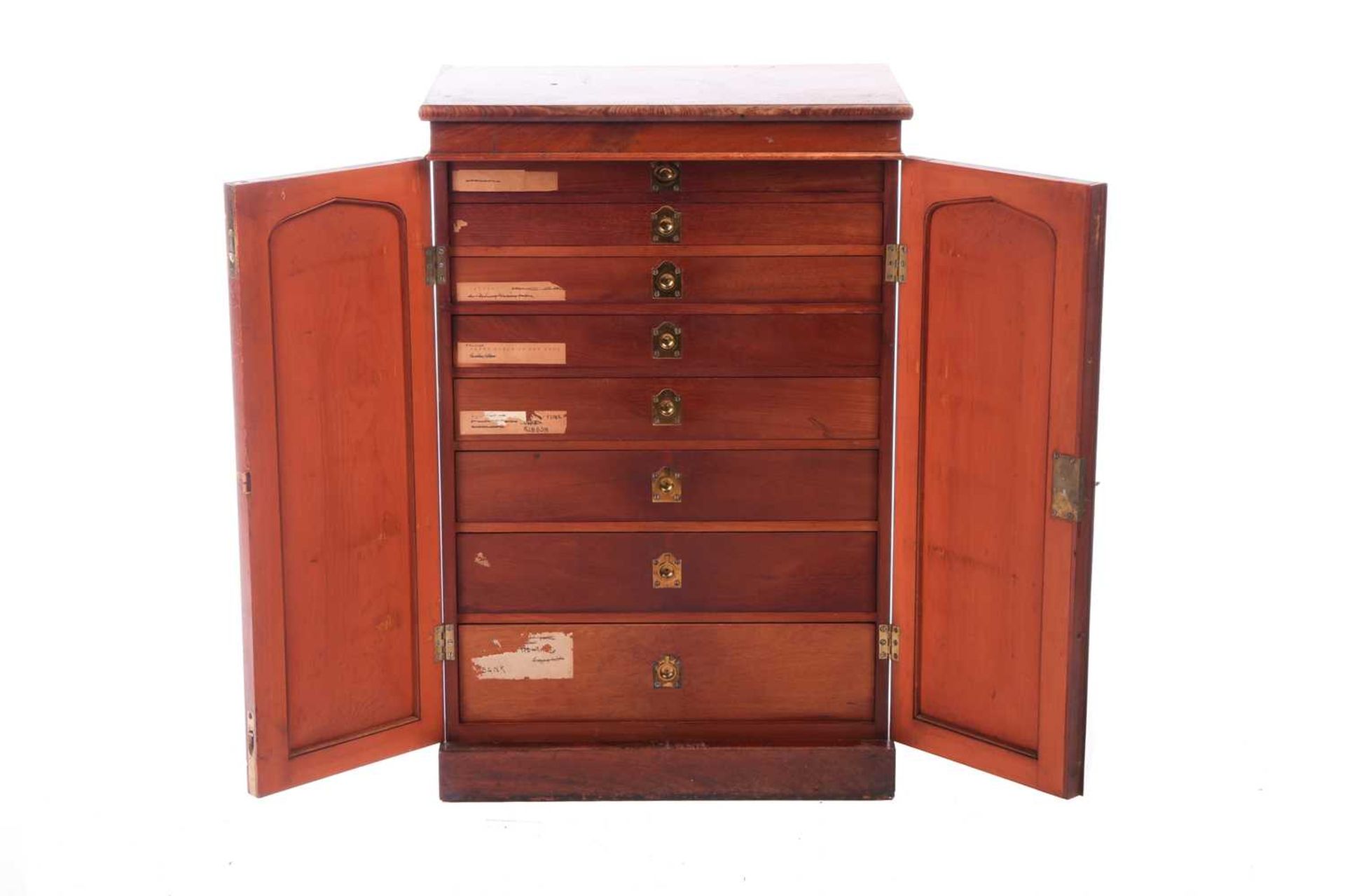 A mid-Victorian flame mahogany collector's cabinet, the pair of arched panelled doors enclosing eigh - Image 2 of 8