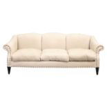 A contemporary triple camelback three-seat sofa, with oatmeal herringbone silk stuff over upholstery