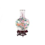 A large 18th-century style Chinese porcelain famille rose heavy baluster vase, 20th-century, with pe