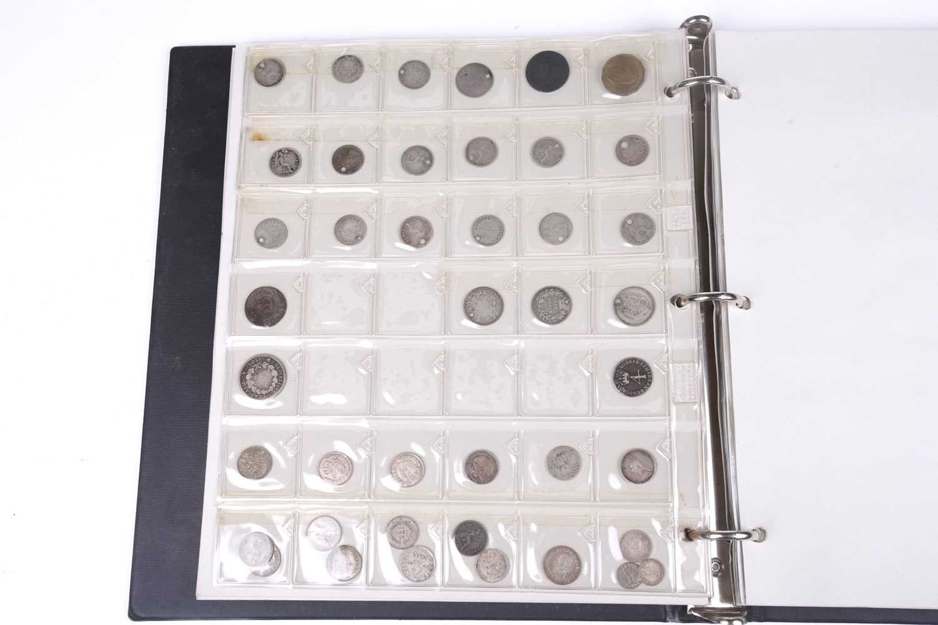 An album containing a collection of coins, George II and later, to include silver crowns and coins,  - Image 7 of 20