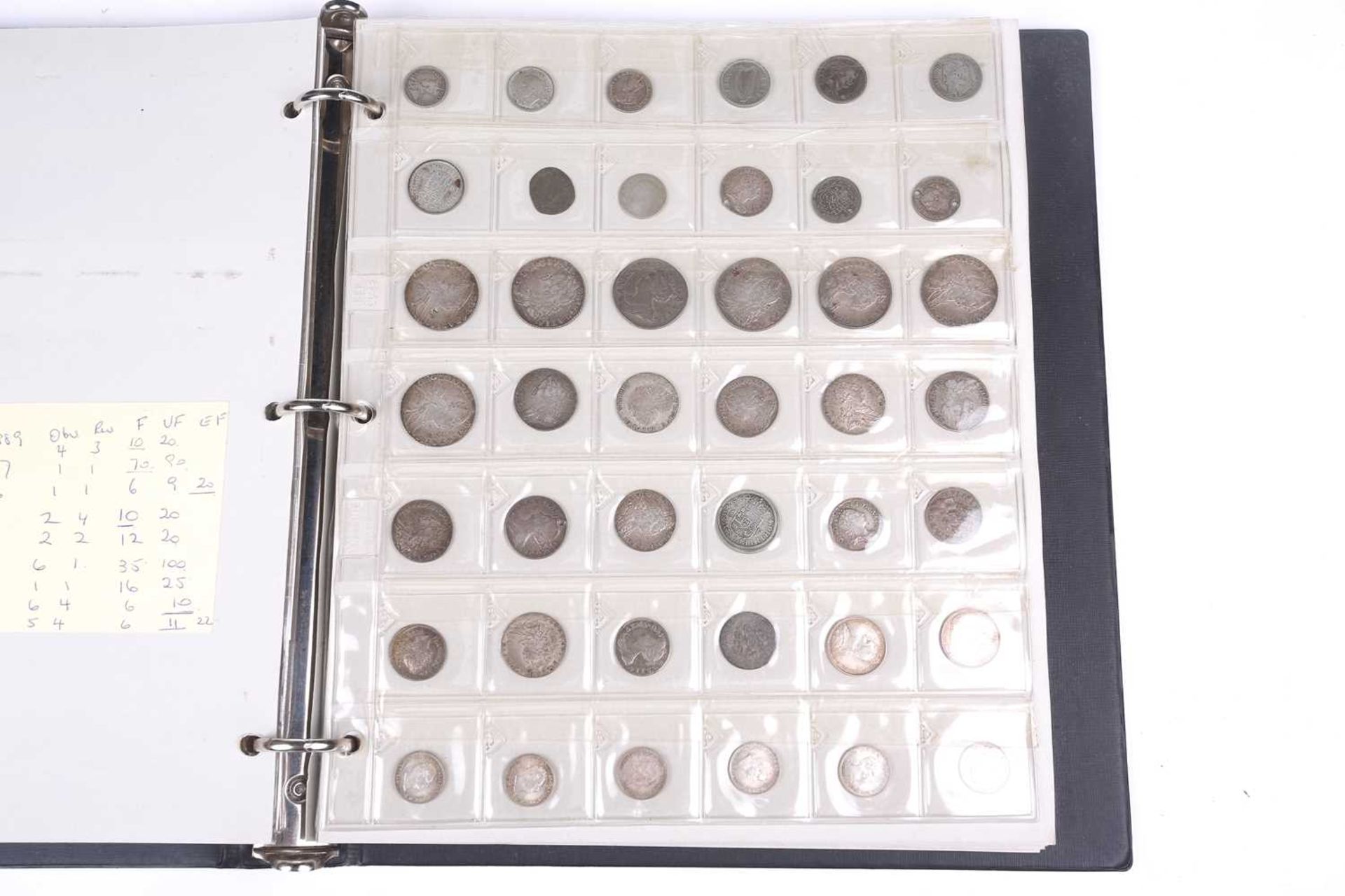 An album containing a collection of coins, George II and later, to include silver crowns and coins,  - Image 18 of 20
