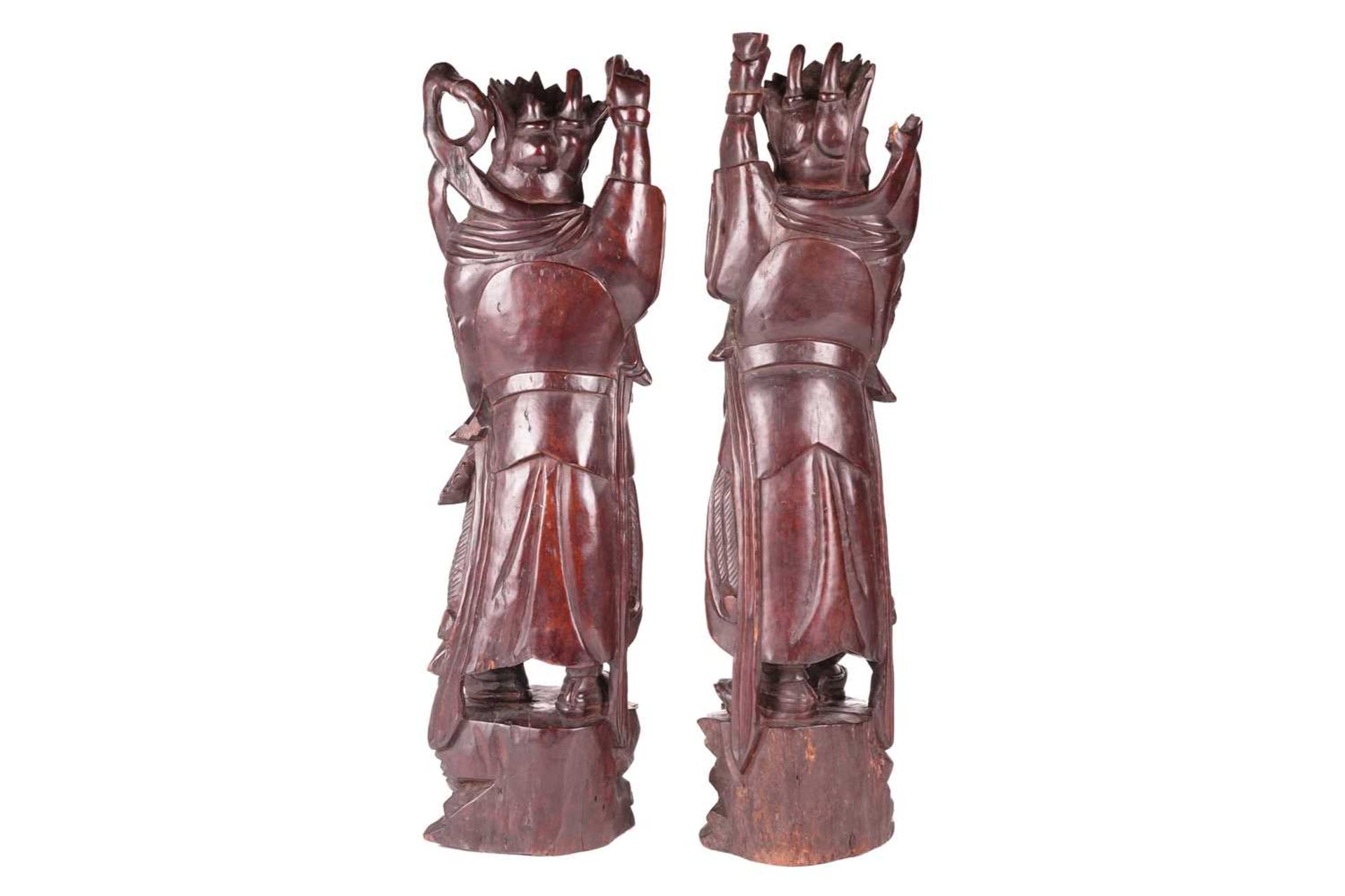 A pair of Chinese carved cherry wood figures of warriors one possibly Xianwu both with inset glass b - Image 4 of 11
