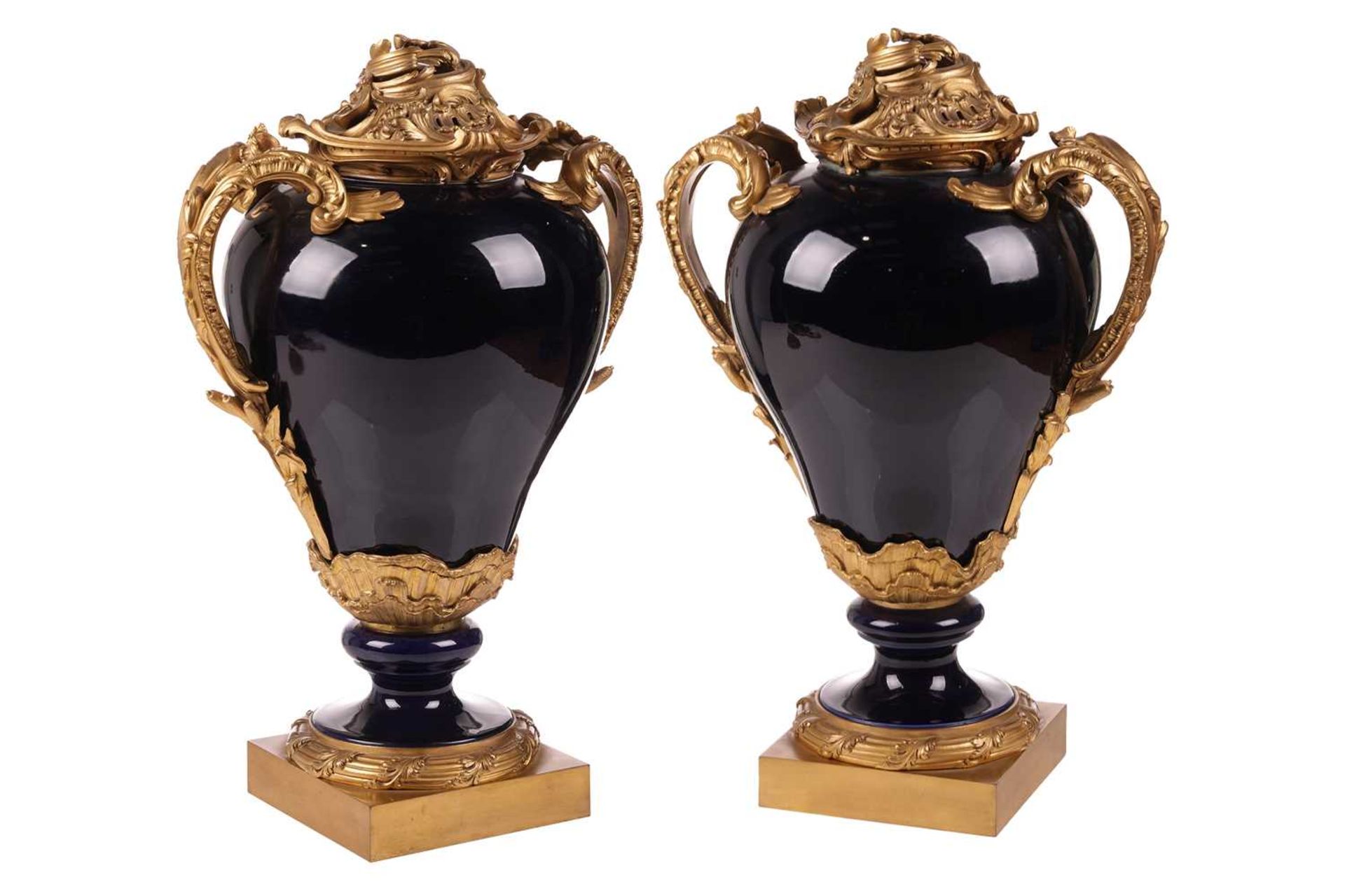 A pair of large French 19th-century porcelain and ormolu mounted vases, of imposing proportions, wit