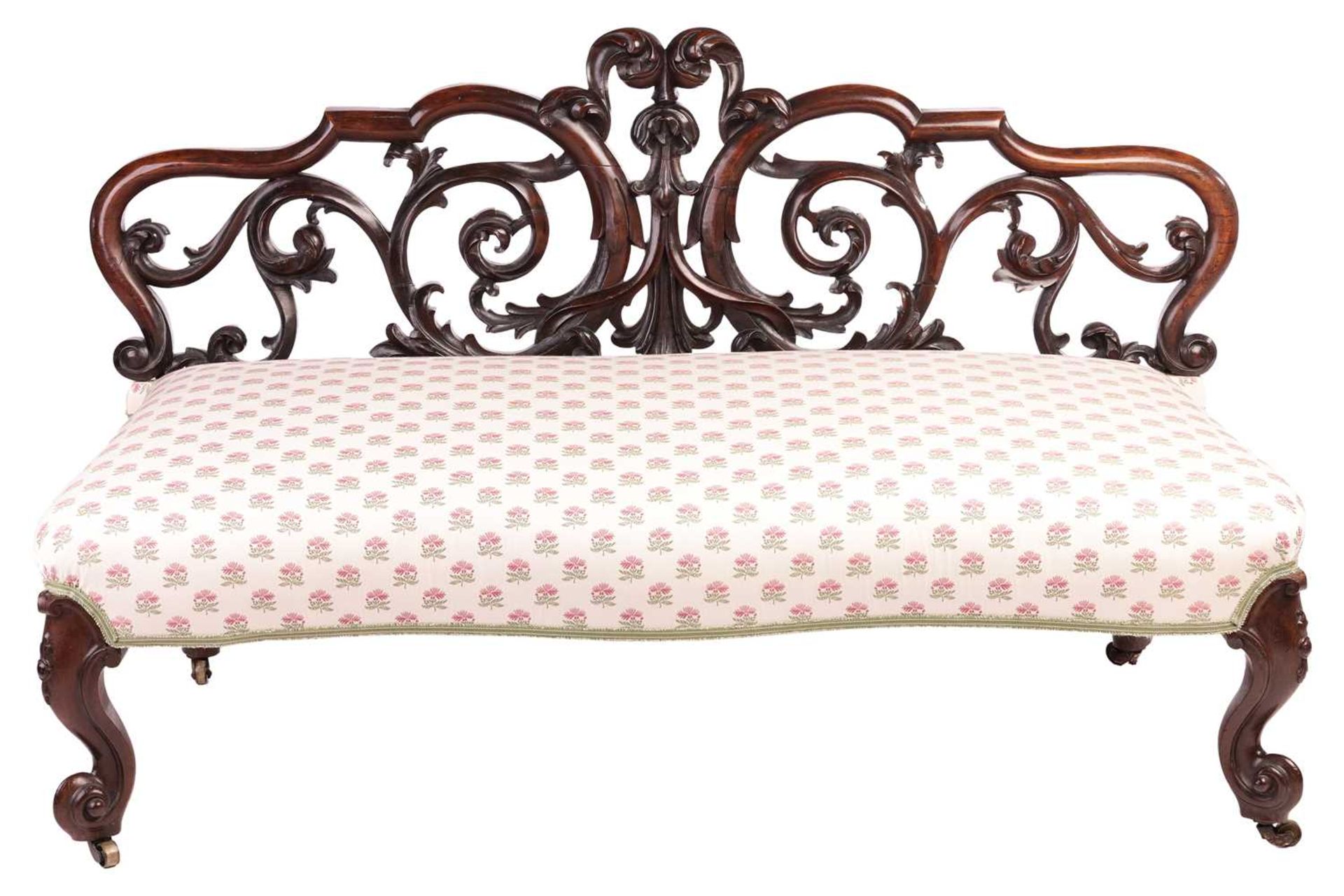 An unusual Victorian rosewood window seat/Couch, with an openwork back carved with scrolls over a st - Image 4 of 7