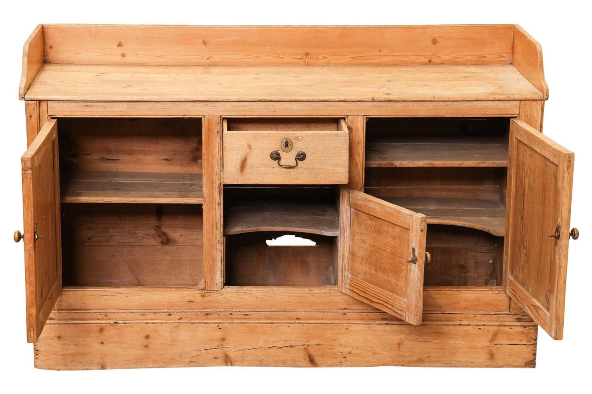 A North Country pine dresser, the three-quarter raised gallery over a central drawer and panelled cu - Image 2 of 3