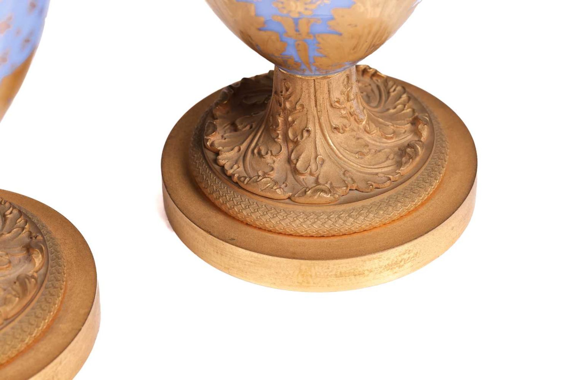 A pair of late 19th century French blue opaline glass and ormolu mounted vases, with gilt-overlaid d - Image 4 of 7