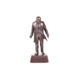 After David McFall (1919-1988) Scottish, a patinated bronze figure of Winston Churchill, standing on