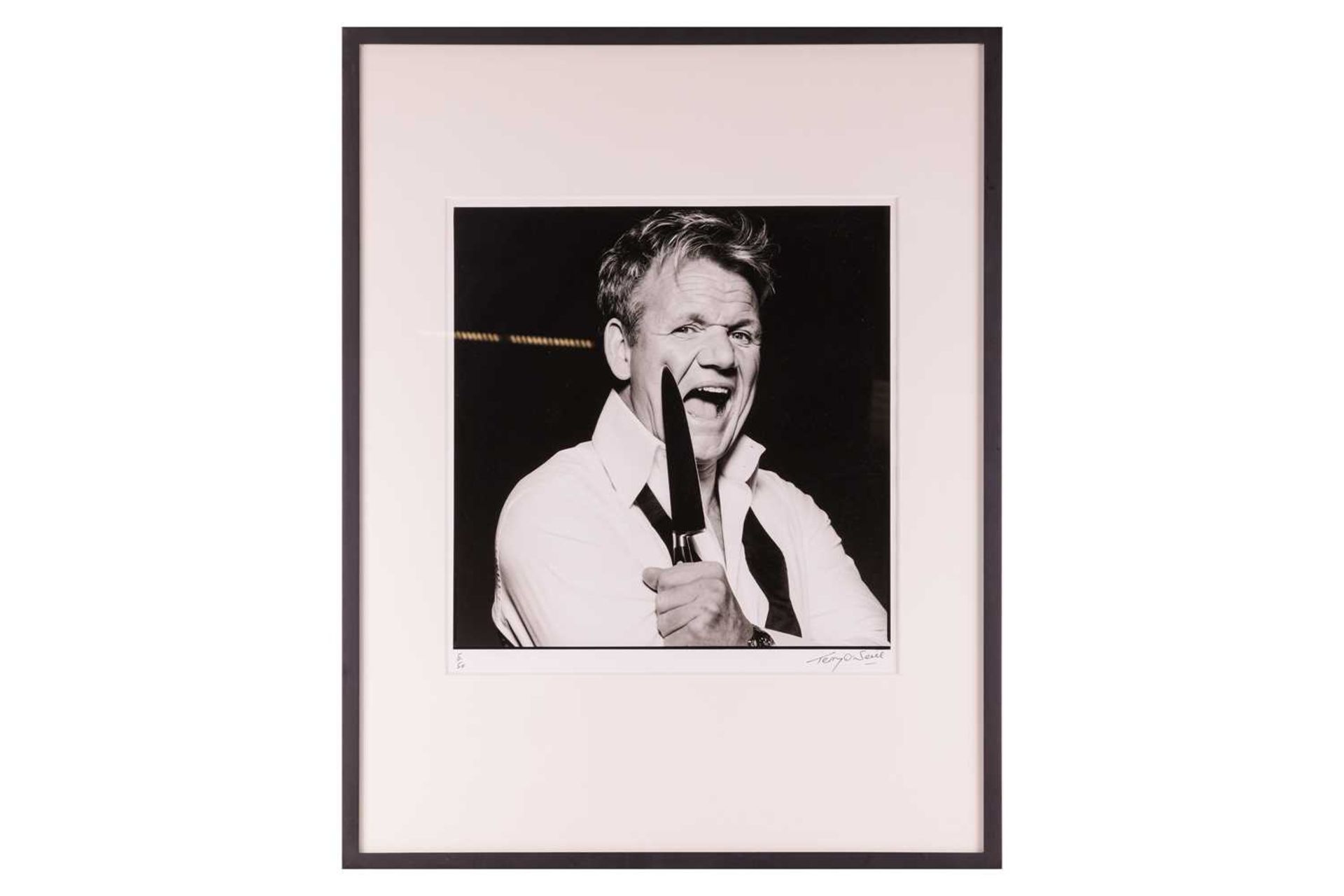 Terry O'Neill (1938 - 2019), Gordon Ramsay with Knife (2007), signed 'Terry O'Neill' (lower right) n