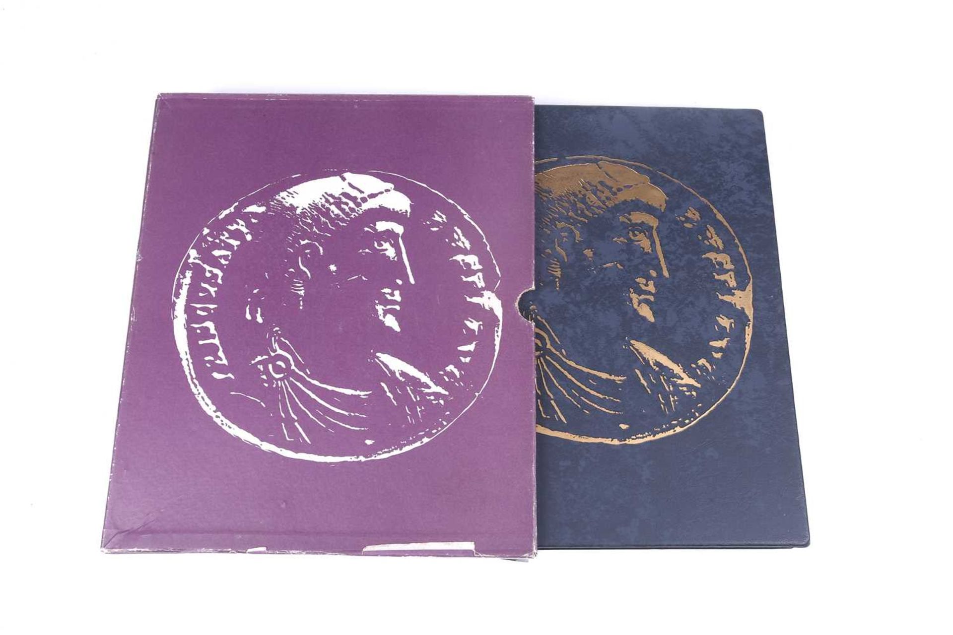 An album containing a collection of coins, George II and later, to include silver crowns and coins, 