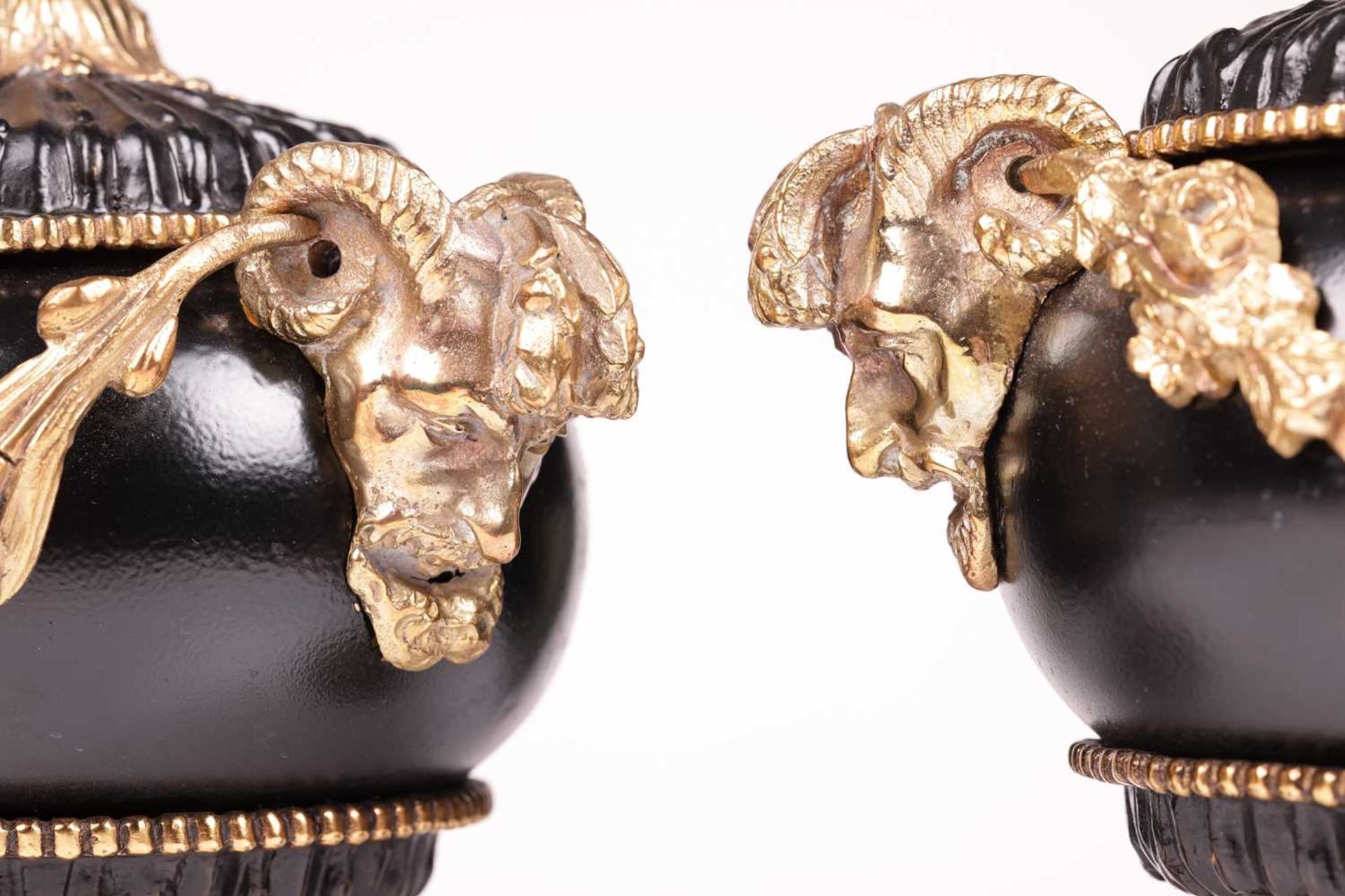 A pair of Neo-classical black lacquer urns and covers, with gilt bronze mounts, mask handles with fl - Image 6 of 8