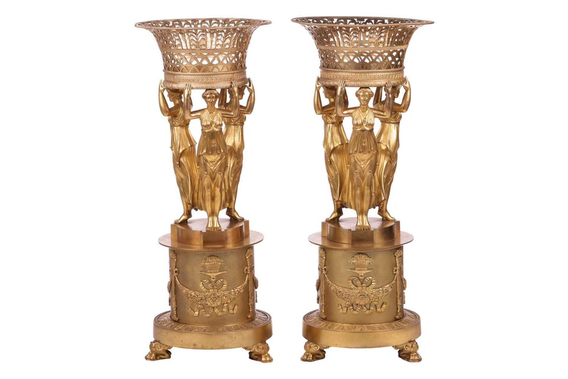 Manner of Pierre-Philippe Thomire (1751-1843) French, a pair of large ormolu Empire figural centrepi