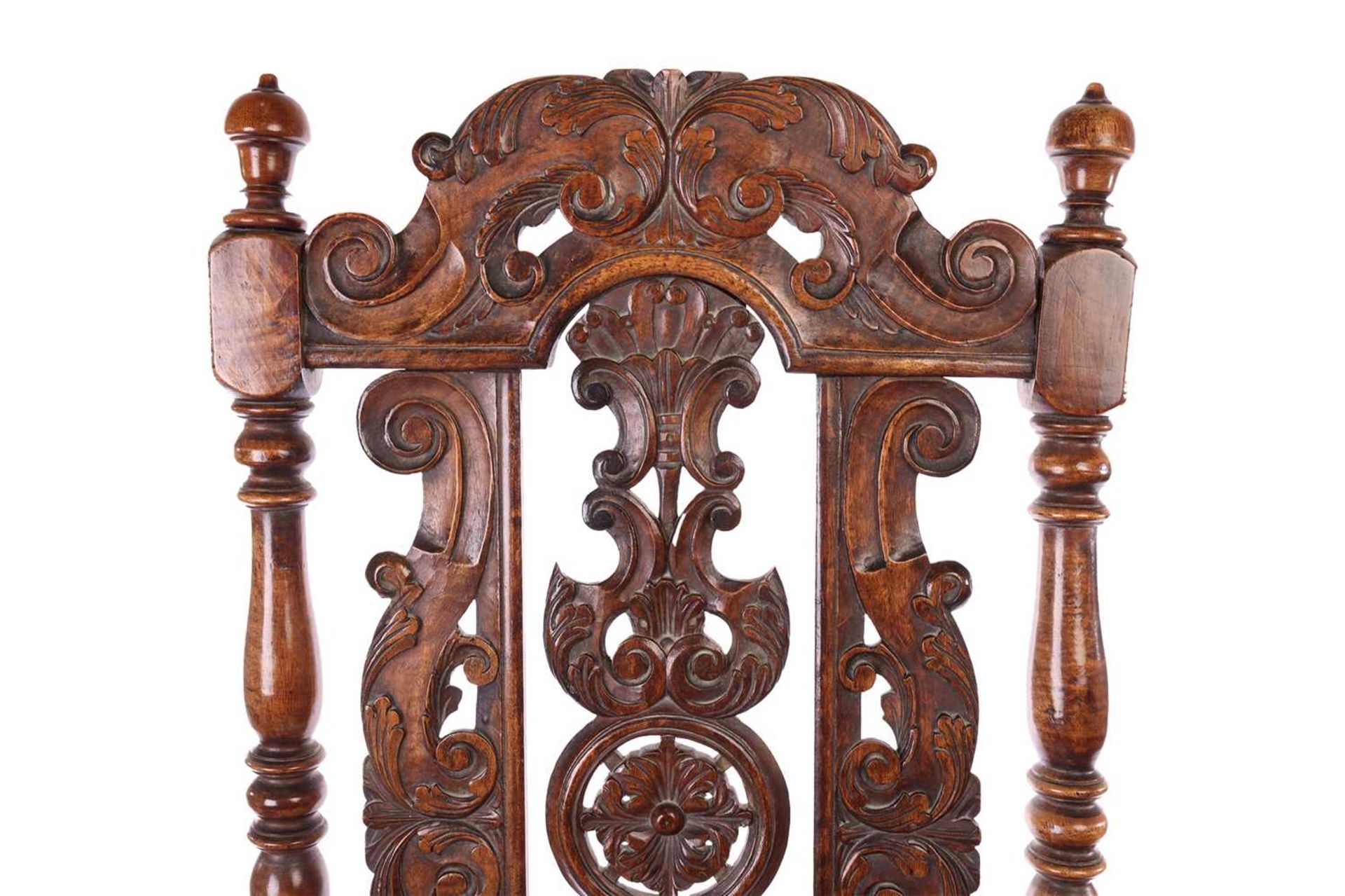 A near pair of Victorian carved oak open armchairs, in the Carolean style, with open S-Scroll, roset - Image 3 of 6