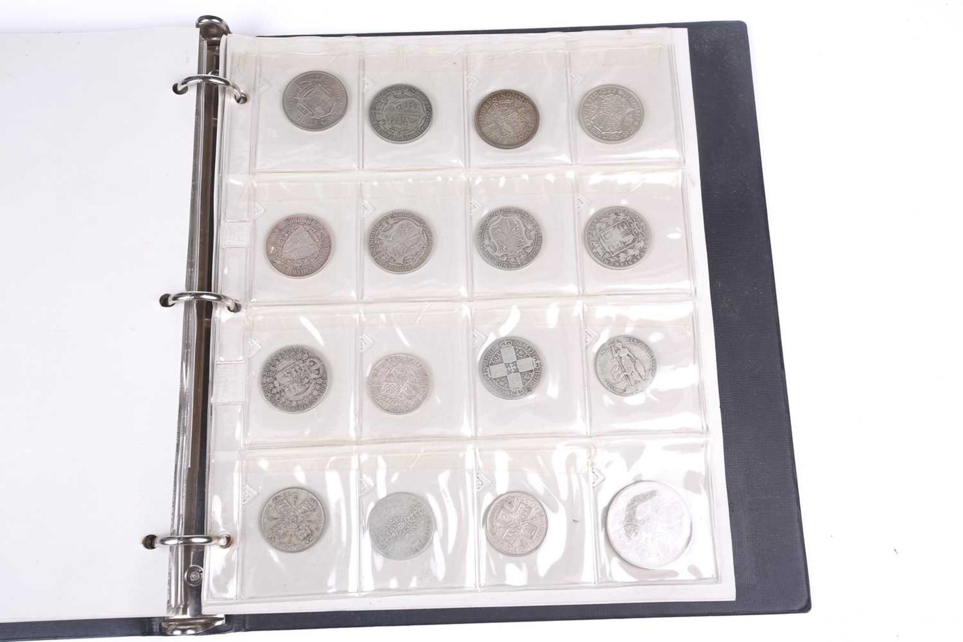 An album containing a collection of coins, George II and later, to include silver crowns and coins,  - Bild 10 aus 20