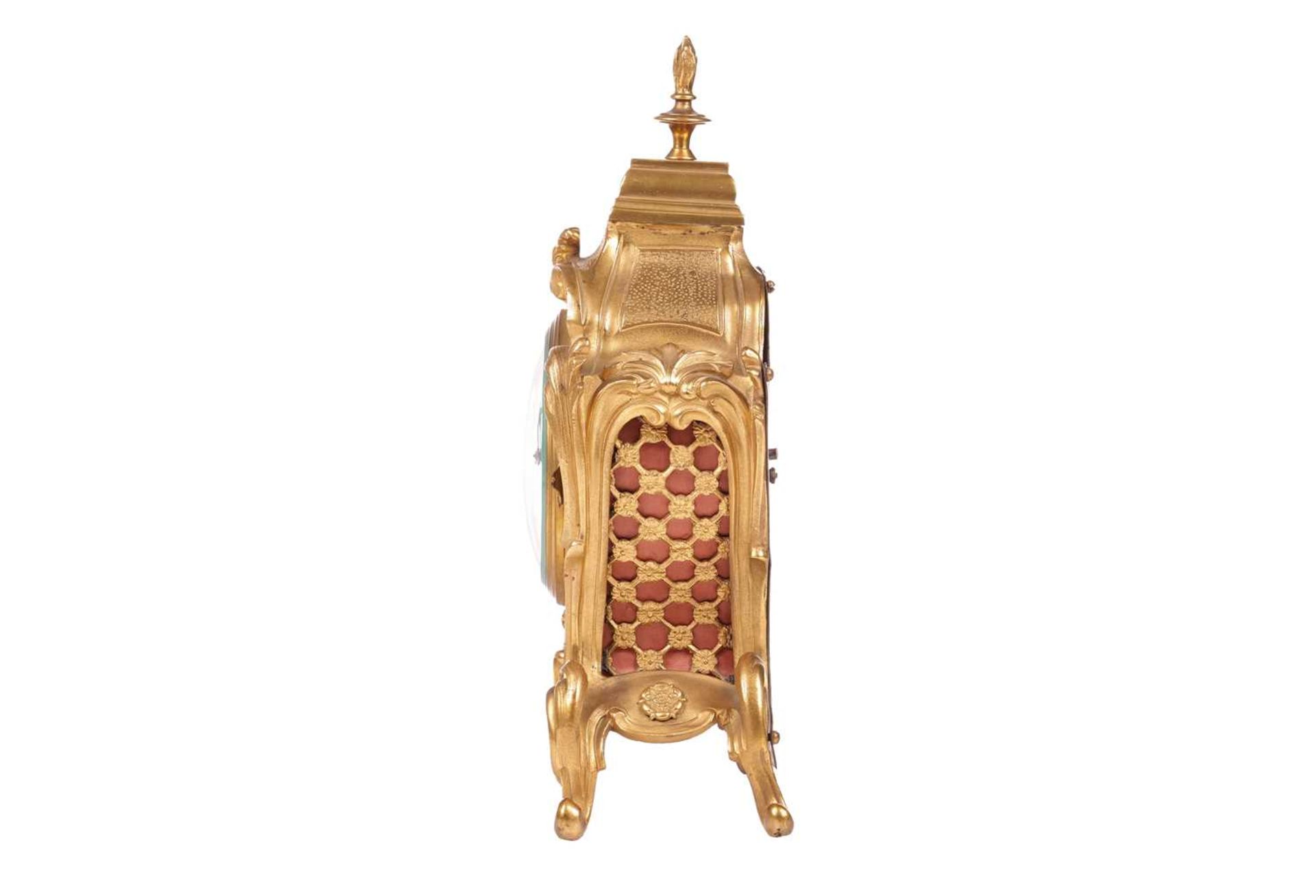 A late 19th/early 20th-century French gilt metal mantel clock, the foliate scroll form case with fla - Image 5 of 7