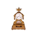 A Napoleon III ormolu drum-head form 8-day mantel clock by Japy Bros, retailed by Howell James &amp;