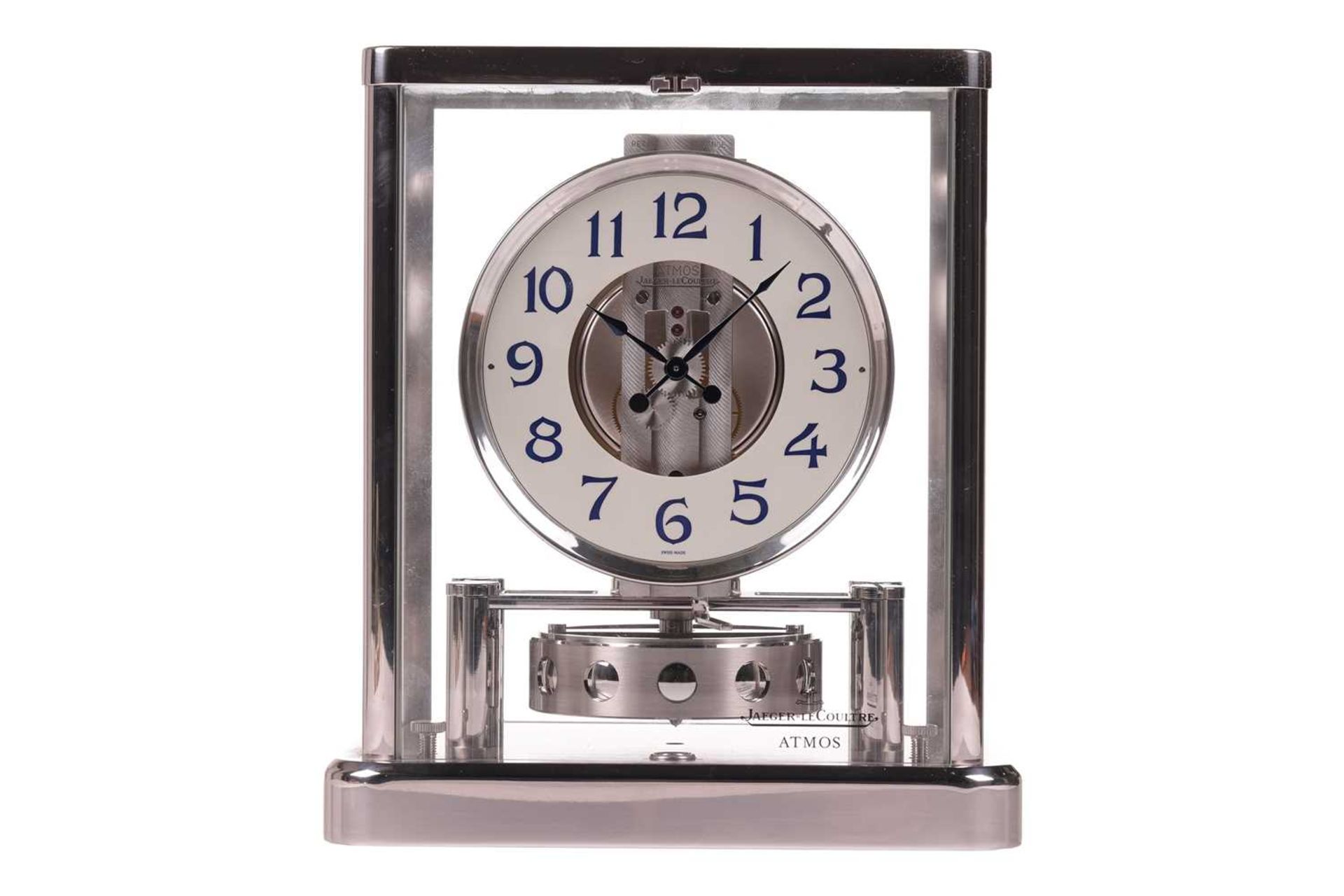 A Jaeger Le Coultre Rhodium plated Atmos 'Classique' mantel clock, the circular dial bearing Arabic 