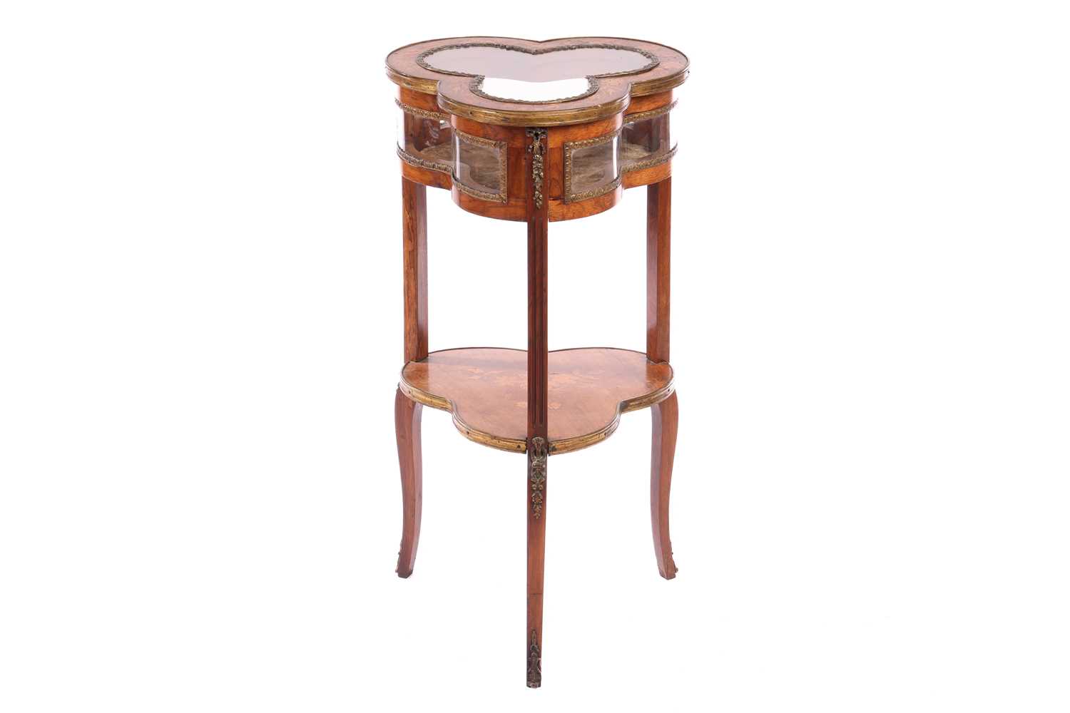 A Napoleon III walnut and marquetry "Club" shaped bijouterie table, with gilt metal mounts throughou